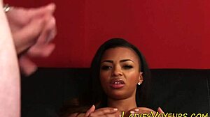 EBONY DOMINA SPREADS LEGS WIDE FOR HEEL DOMINATION!