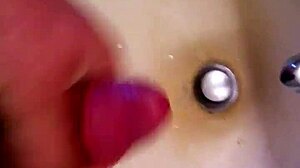 guy strokes big cock to huge cumshot in solo masturbation clip