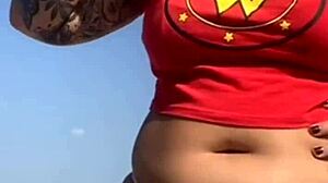 guy gets so turned on by my beach tattoo he flashes his cock and begs to see my big tattooed pussy