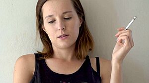 this cute blue-eyed brunette babe smokes teasing her petite voyeur curves slowly