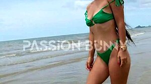 Daring Petite Brunette Flashes on Public Beach