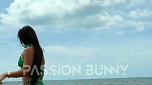 Daring Petite Brunette Flashes on Public Beach