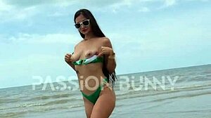 Daring Petite Brunette Flashes on Public Beach
