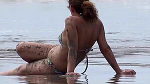 real cuck beach vid: hubby blasts huge load on wife while she fingers pussy