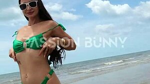 Daring Petite Brunette Flashes on Public Beach