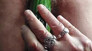 Oma shoves cucumber deep in old hairy beaver slut granny fucks hard