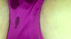 her fingers part wet lips during steamy panty massage