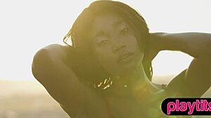 Petite ebony milf strips bare juicy tits poolside