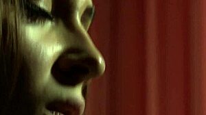 Petite brunette fingers clit watching herself masturbate in mirror