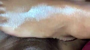 Ebony wife's teasing footjob hides pretty toe secrets