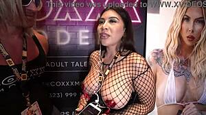 Tokyo Lynn's Exxxotica Miami Interview at Coxxx Booth