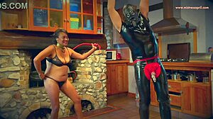 Bound brunette milf submits to dominatrix april's intense fisting and humiliating licks