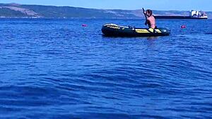 mature beauty poses bikini on volga river boat