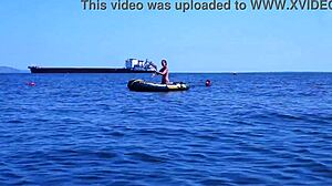 mature beauty poses bikini on volga river boat