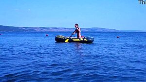 mature beauty poses bikini on volga river boat