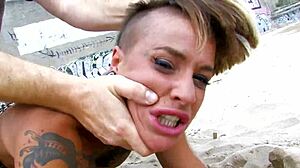 wanna see this short haired tattooed milf get fucked hard right on the beach?