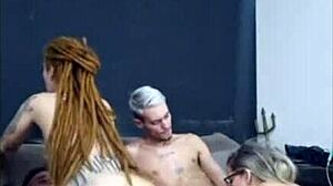 A fiery redhead dreadsitter rides my buddy while his wife sucks me off hard!