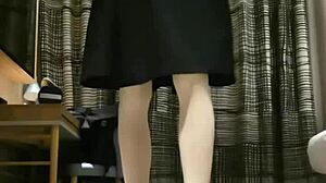 Watch this tranny femboy stroke her cock in black dress until massive cum explosion