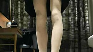 Watch this tranny femboy stroke her cock in black dress until massive cum explosion