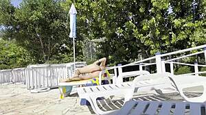 Milf grabs big cock for handjob by public pool leading to massive outdoor cumshot