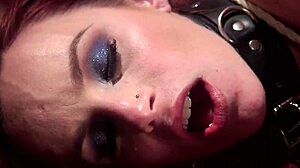 Blonde Whips Redhead's Bound Ass Hard