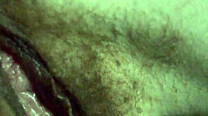 Watch me finger my wet pussy in dim light, doesn't it drip for you?