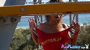 Stunning milf lifeguard miluniel louis poses with perfect tits on beach