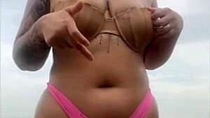 She begs him whip out hard cock from beach shorts