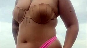 She begs him whip out hard cock from beach shorts