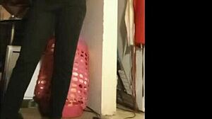 short clip of model oiling up and stripping sexy