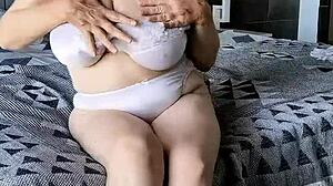 Busty Granny's White Lingerie Dildo Fuck Leads to Shaking Orgasm