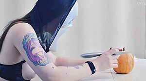 sexy ghostface carves erotic pumpkin for halloween trick treat