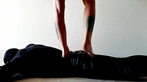 Dominatrix Nika Boldly Tramples Slave's Belly with Feet Stomach Press Fetish