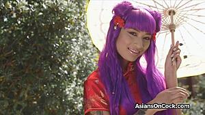 Chinese babe fingers herself before taking big cock in silk dress