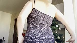 Does big tits blonde's pussy ache near the Christmas tree?
