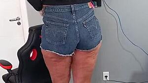 i slip into these sexy shorts showing off my tan lines and curves just for you