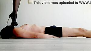 Dominatrix Nika Boldly Tramples Slave's Belly with Feet Stomach Press Fetish