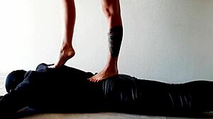Dominatrix Nika Boldly Tramples Slave's Belly with Feet Stomach Press Fetish