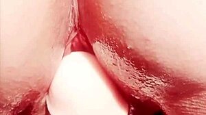 mature mom spreads oiled shaved pussy lips for close-up tease