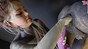 tattooed dominatrix stretches tranny's ass with brutal fisting in goth femdom anal session