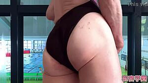 Slutty crossdresser cums in women's swimsuit during secret classroom masturbation orgy!