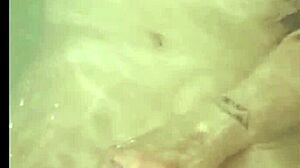 chubby big tits babe plays in bathtub shower with vibrator orgasms