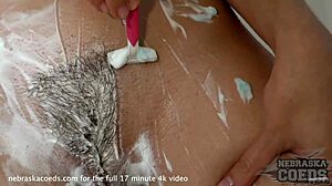 22yo blonde lucia shaves hairy pussy then showers with glass dildo masturbation