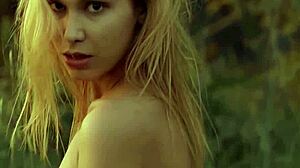 Petite all natural Ukrainian blondie Emily Rise strips naked among huge desert cacti