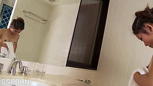 the sexy thai brunette soaks her hairy wet pussy in the shower then grabs her dildo to masturbate her natural tits beaver