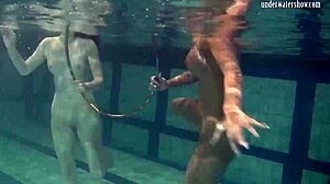 russian lesbian babes splash kiss and grope juicy tits underwater in pool