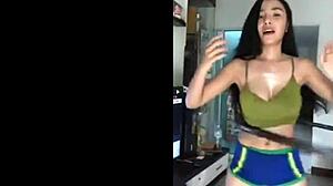 Sweaty Thai whore shakes massive fake tits in erotic dance routine