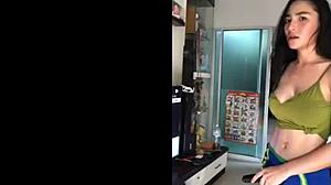 Sweaty Thai whore shakes massive fake tits in erotic dance routine