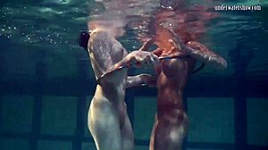 russian lesbian babes splash kiss and grope juicy tits underwater in pool