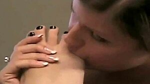 her pussy drips wet from pantyhose fetish as lesbian femdom teases feet bdsm style